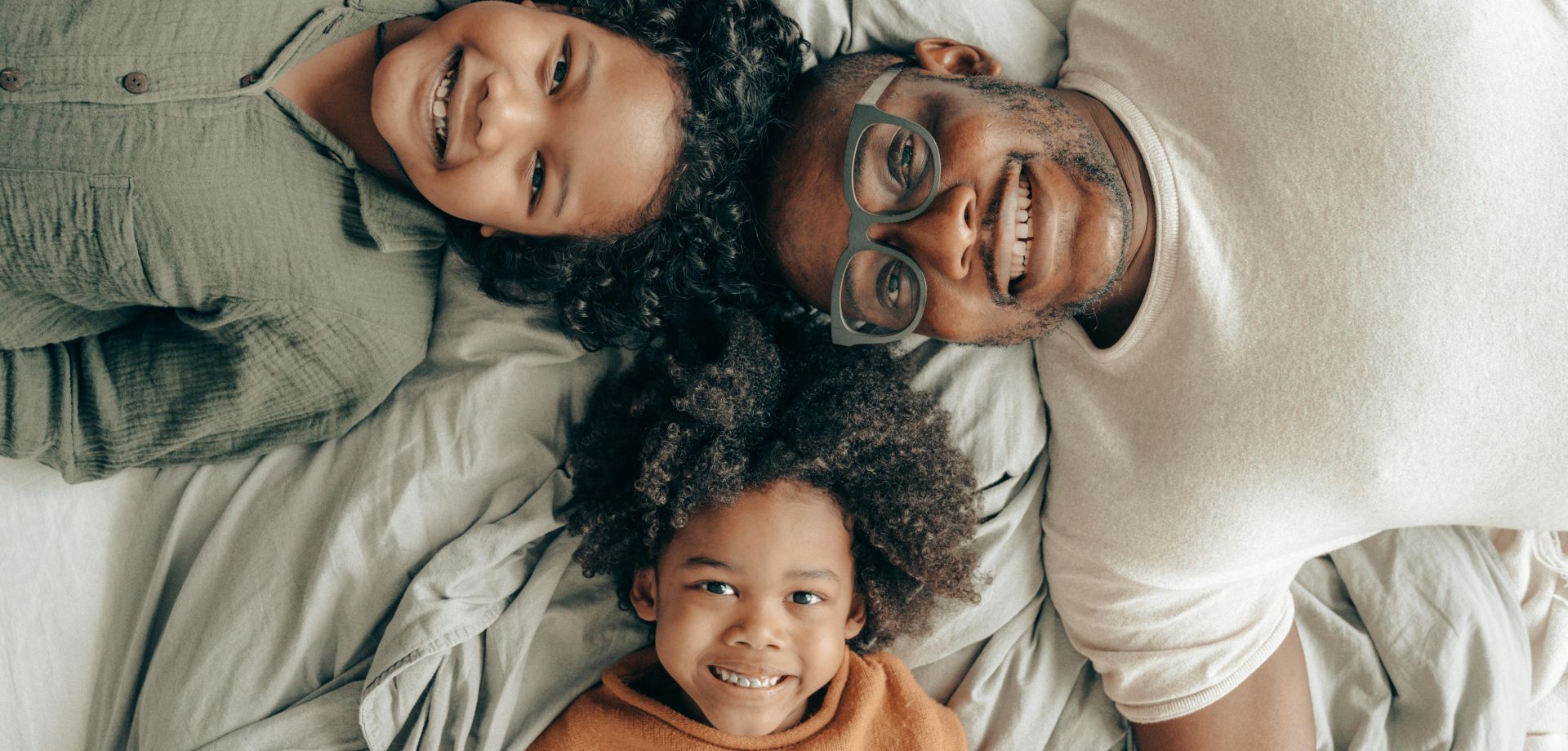 Happy Family Looking at the Camera