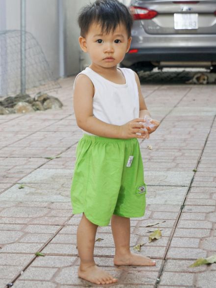 Photo of Boy Standing Outside