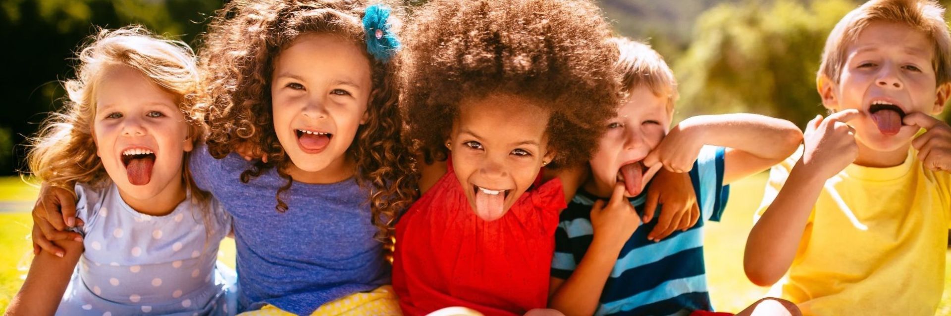A Family Smiling for a Groupie Photo Shot